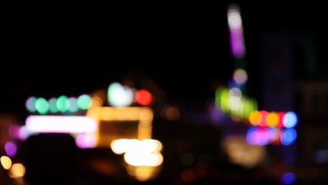 Fairground with colorful blinking blurry lights at night Stock Footage 123071295