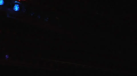 Fairground at night.  light pattern from a ride at Pacific national Exhibition Stock Footage 27640965