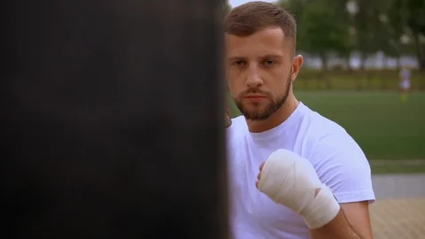 Fairhaired man has a training outdoors Stock Footage 93819851