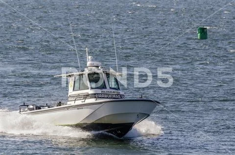 Fairhaven harbormaster nearing New Bedford hurricane barrier Stock Photos