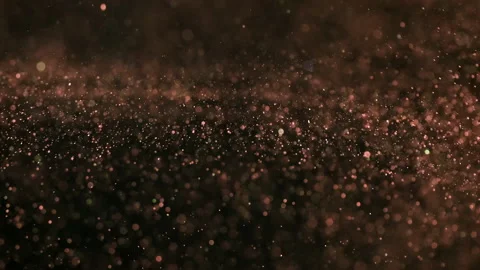 The fairy fly of red particles on the dark background. slow motion Stock Footage 160064356