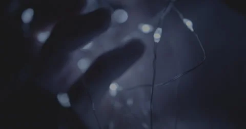 Fairy Lights Abstract Movement Close Up Hand Touching Stock Footage 167522367