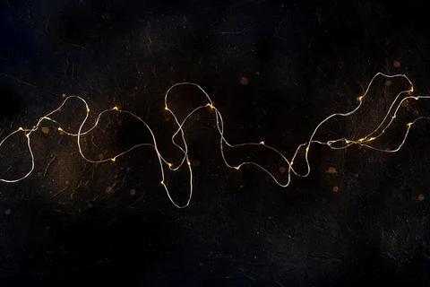 Fairy lights on black. String led garland, shot from the top Foto stock