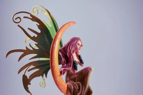 Fairy on the moon Stock Photos