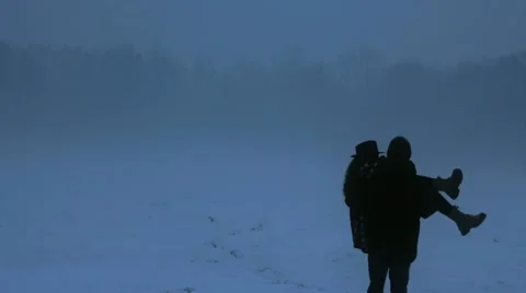 Fairy tale couple on snowfall Stock Footage 19556145