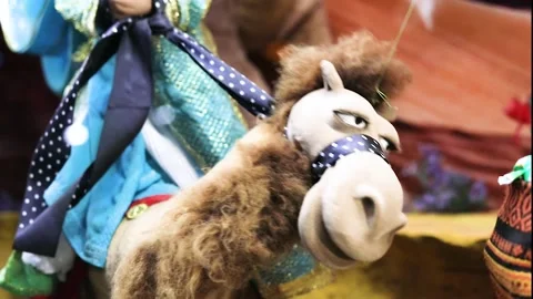 Fairytale camel face moving on strings Stock Footage 302975807