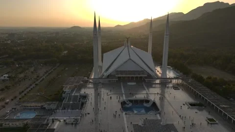 Faisal Masjid in Islamabad at Sunset. Prayers gathered in largest Mosque in Video stock 292888515