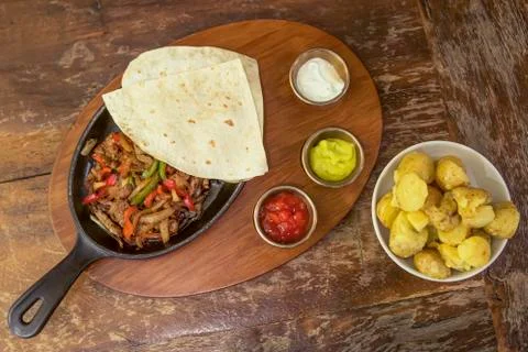 Fajitas &amp; potatoes Stock Photos