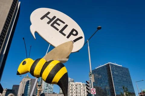 Fake Bee with Help Stock Photos
