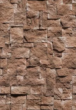 A fake stone in the form of a sharp bumpy tile of brown color .Texture or 스톡 사진