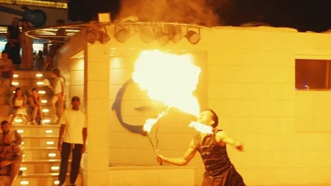Fakir breathing fire fire show at Gravity Aqua park Hotel. Stock-Footage 343411630
