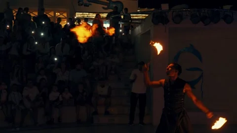 Fakir breathing fire fire show at Gravity Aqua park Hotel. Stock Footage 343412182