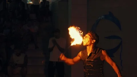 Fakir breathing fire fire show at Gravity Aqua park Hotel. Stock Footage 343412192