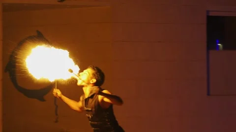 Fakir breathing fire fire show at Gravity Aqua park Hotel. Stock Footage 343412326