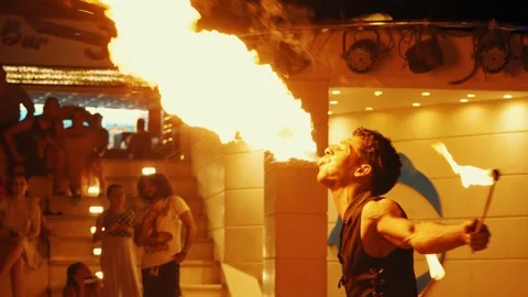Fakir breathing fire fire show at Gravity Aqua park Hotel. Stock Footage 343412466