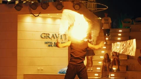 Fakir breathing fire fire show at Gravity Aqua park Hotel. Stock Footage 343412475