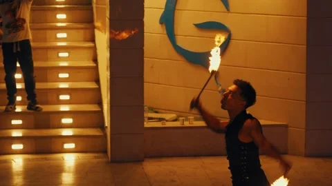 Fakir breathing fire fire show at Gravity Aqua park Hotel. Stock Footage 343412612