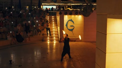Fakir breathing fire fire show at Gravity Aqua park Hotel. Stock Footage 343412615