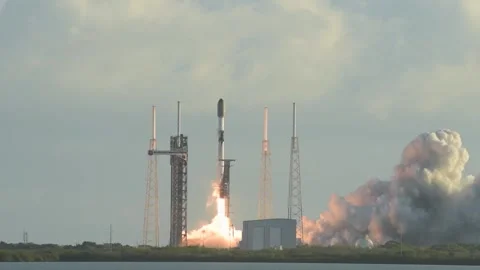 Falcon 9 Rocket carrying the Starlink 10-58 launches from Cape Canaveral Stock Footage 334835325