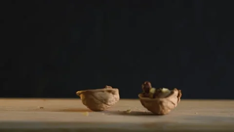 Fall and Crack the walnuts, Broken walnuts with drop and open. Stock Footage 168155763