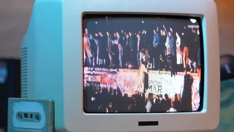 Fall of Berlin Wall on a 80s 90s Retro Television CRT Screen Stock Footage 109126189
