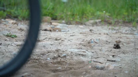 Fall off the bike. Sandy ground. Uncertain ride. Fall to the ground Stock Footage 133590191