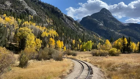 Fall color and scenery from train on Durango and Silverton Stock Footage 121896405