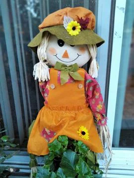 Fall color theme rag doll garden decor Stock Photos