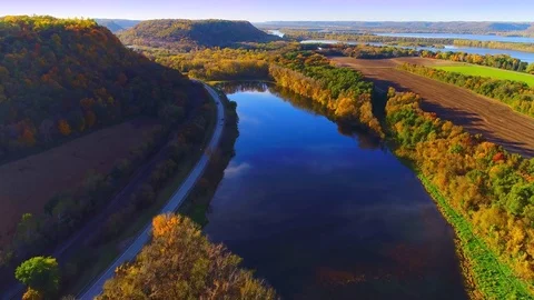 Fall colors adorn the hills of Eastern Minnesota near the Mississippi River Stock Footage 85397048