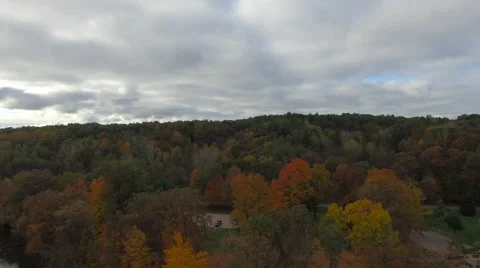 Fall colors, drone shot over Fallsburg park, Michigan Stock Footage 56336230