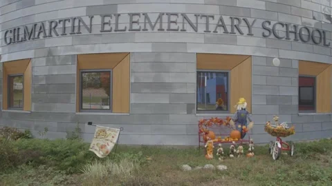 Fall decorations in front of Gilmartin Elementary School Stock Footage 304373053