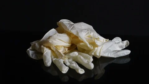 Fall of disposable latex gloves Stock Footage 127513221