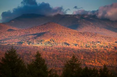Fall foliage with mt. mansfield in the background. Stock Photos