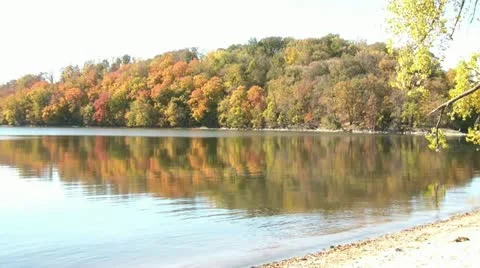 Fall Foliage Reflecting on Lake Stock Footage 12578557