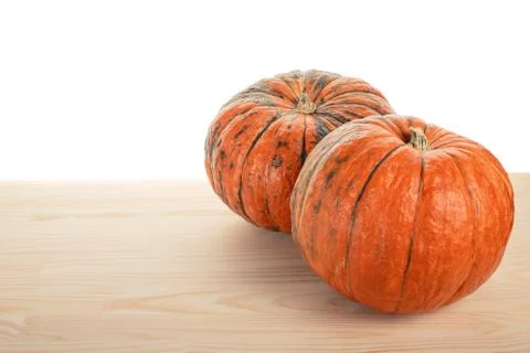 Fall harvest of two pumpkins isolated on white background. Two juicy organic  Stock Photos