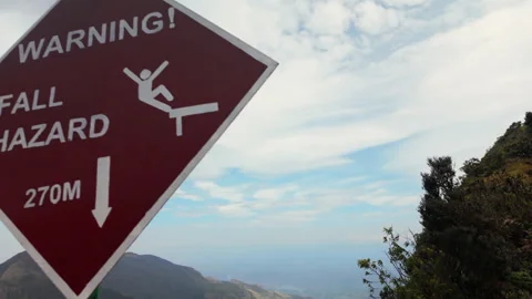 Fall Hazard warning at World's End in Sri Lanka's Horton Plains National Park Stock Footage 327603653