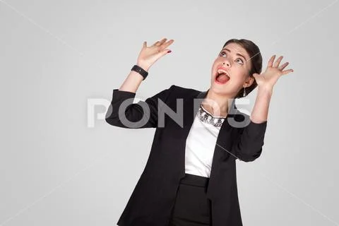 Fall on head. Shocked woman looking up and shout Stock Photos
