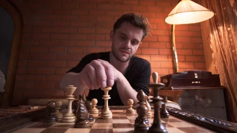 Fall of king in chess. young man lost battle and main figure falls. concept of Stock Footage 158065996