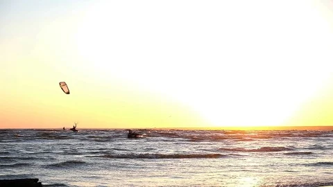 The fall of the kitesurfer from the board, the parachute pulls the athlete into 動画素材 90624034