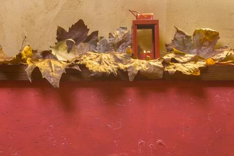 Fall leaves and the wall as a background Stock Photos