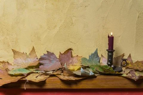 Fall leaves and the wall as a background Stock Photos