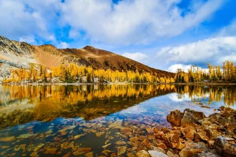 Fall Mountain Reflection with blue skies, British Columbia, Canada Stock Photos