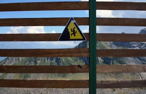 Fall from mountain warning sign 写真素材