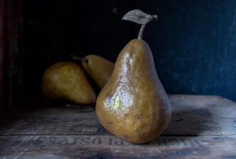 Fall pears in rustic setting Stock Photos