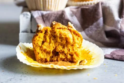 Fall pumpkin muffins with walnuts. Stock Photos