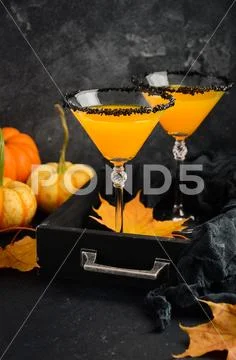 Fall Seasonal Cocktail Pumpkin Martini or Pumpkintini Stock Photos