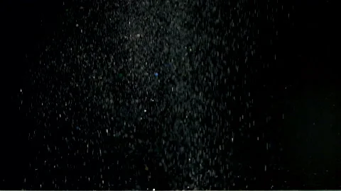 The fall of silvery particles. slow motion Video stock 160060761