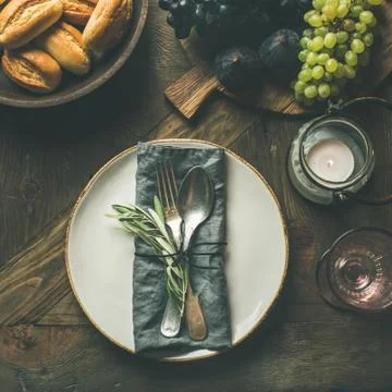 Fall table decoration setting with cutlery and snacks, copy space Stock Photos