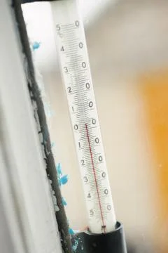 Fall in temperature on thermometer scale Stock Photos