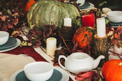 Fall thanksgiving table setting with festive decor Stock Photos
